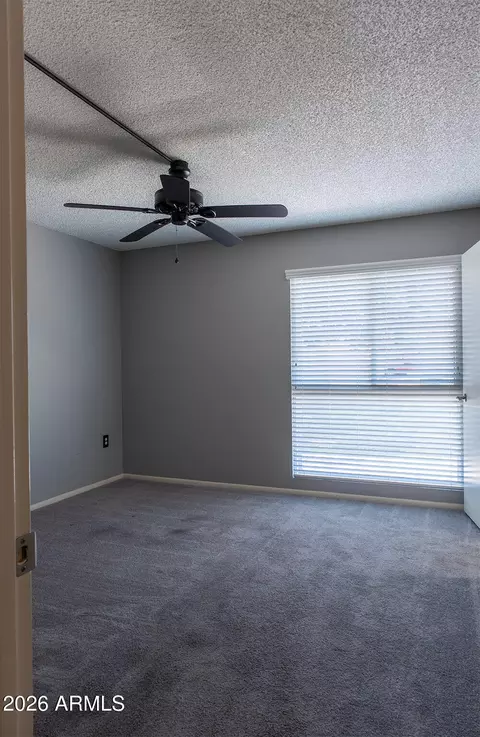 Bedroom - 10020 W Royal Oak Rd #E, Sun City, AZ 85351 photo 2 of 2