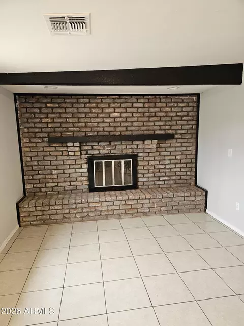 Living - 3530 N 63rd Dr, Phoenix, AZ 85033 photo 3 of 3