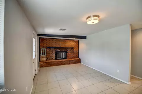 Living - 3530 N 63rd Dr, Phoenix, AZ 85033 photo 2 of 3