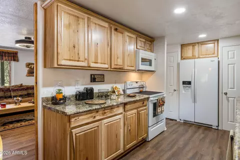 Kitchen - 2976 Pine Rim Rd, Overgaard, AZ 85933 photo 2 of 4