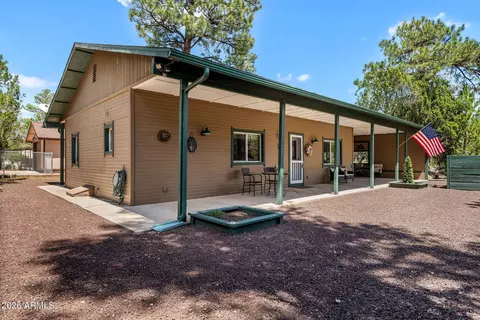 Exterior - 2976 Pine Rim Rd, Overgaard, AZ 85933 photo 2 of 8