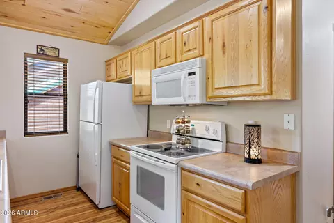 Kitchen - 2327 S Buffalo Loop, Overgaard, AZ 85933 photo 2 of 3