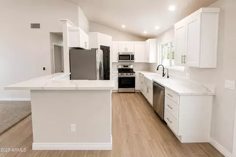 Kitchen - 4517 E Desert View Dr, Phoenix, AZ 85044 photo 1 of 2