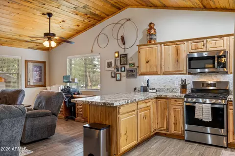 Kitchen - 3111 Cedar Dr, Overgaard, AZ 85933 photo 2 of 3