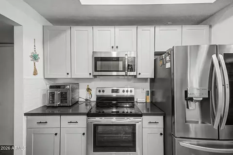 Kitchen - 8028 E Milagro Ave, Mesa, AZ 85209 photo 5 of 5