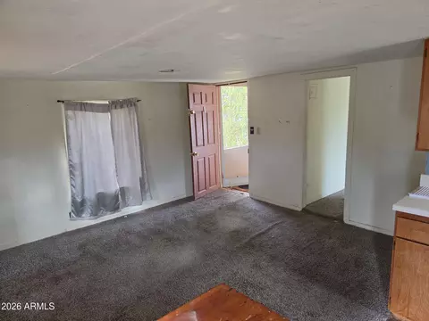 Living - 202 3rd Ave E, Buckeye, AZ 85326 photo 2 of 2