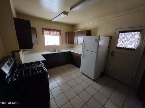 Kitchen - 202 3rd Ave E, Buckeye, AZ 85326 photo 2 of 2
