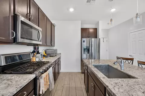 Kitchen - 9431 E Solina Ave, Mesa, AZ 85212 photo 2 of 5