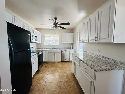 Kitchen - 5737 E Cicero St, Mesa, AZ 85205 photo 2 of 3