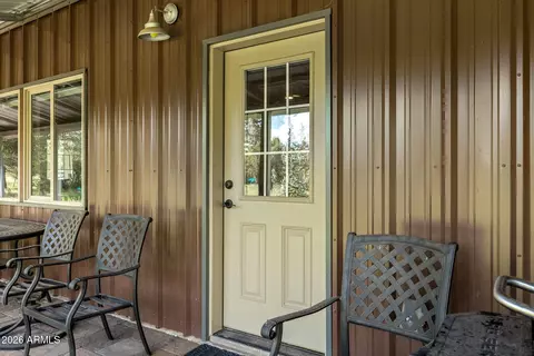 Exterior - 2970 Pine Rim Rd, Overgaard, AZ 85933 photo 3 of 10