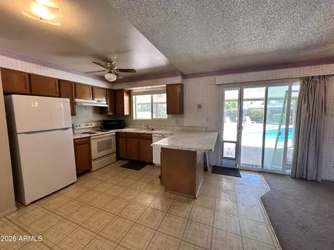 Kitchen - 3421 E Paradise Dr, Phoenix, AZ 85028 photo 2 of 3