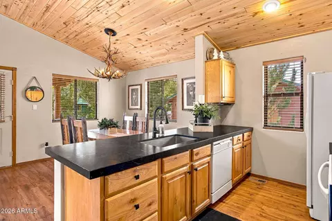 Kitchen - 2332 Buffalo Loop, Overgaard, AZ 85933 photo 3 of 4