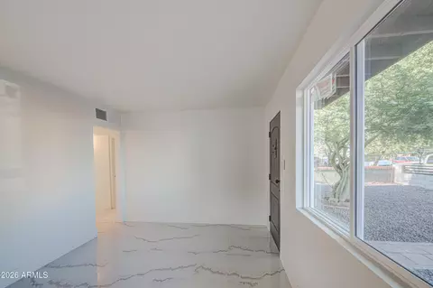 Living - 1648 N 38th Dr, Phoenix, AZ 85009 photo 2 of 4