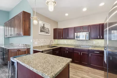 Kitchen - 1519 E Michelle Dr, Phoenix, AZ 85022 photo 2 of 3