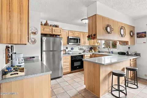 Kitchen - 765 N Alta Vista Dr, Eagar, AZ 85925 photo 2 of 2