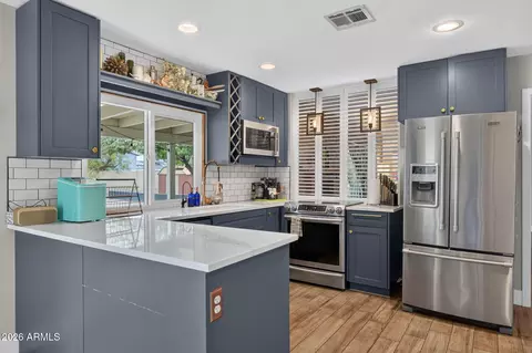 Kitchen - 2360 E Sahuaro Dr, Phoenix, AZ 85028 photo 2 of 5