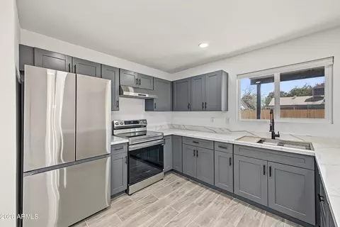 Kitchen - 8847 W Weldon Ave, Phoenix, AZ 85037 photo 2 of 5