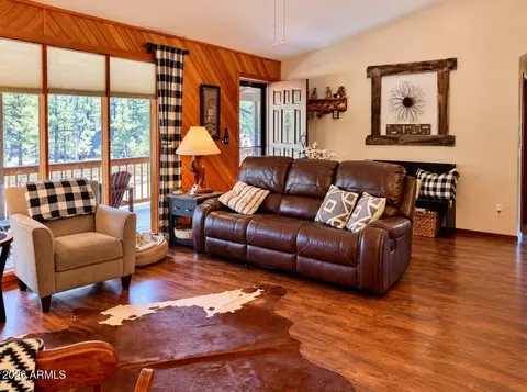 Living - 3346 Whispering Pine Dr, Overgaard, AZ 85933 photo 2 of 2