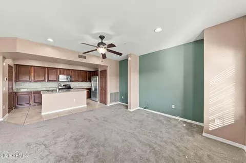 Living - 3935 E Rough Rider Rd #1014, Phoenix, AZ 85050 photo 3 of 5