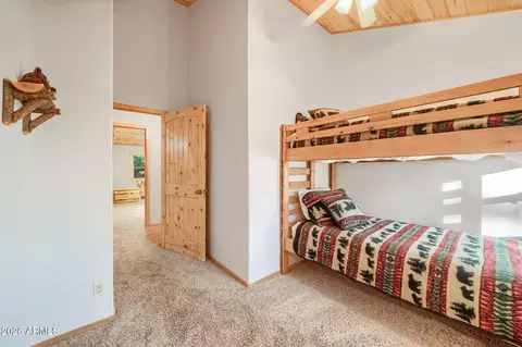 Bedroom - 2790 Pine Rim Rd, Overgaard, AZ 85933 photo 10 of 13