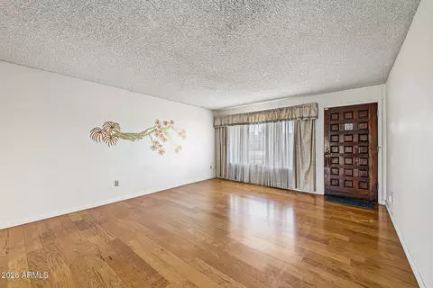Living - 3402 E Paradise Dr, Phoenix, AZ 85028 photo 1 of 7