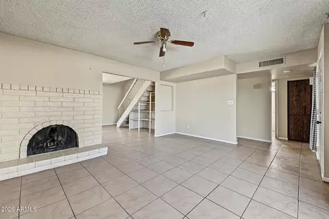 Living - 8717 W Clarendon Ave, Phoenix, AZ 85037 photo 3 of 4