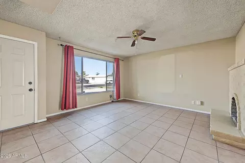 Living - 8717 W Clarendon Ave, Phoenix, AZ 85037 photo 2 of 4