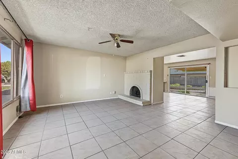 Living - 8717 W Clarendon Ave, Phoenix, AZ 85037 photo 1 of 4