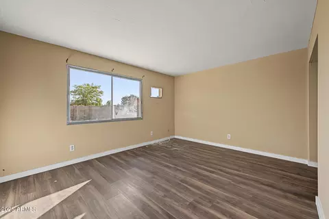 Living - 8717 W Clarendon Ave, Phoenix, AZ 85037 photo 4 of 4