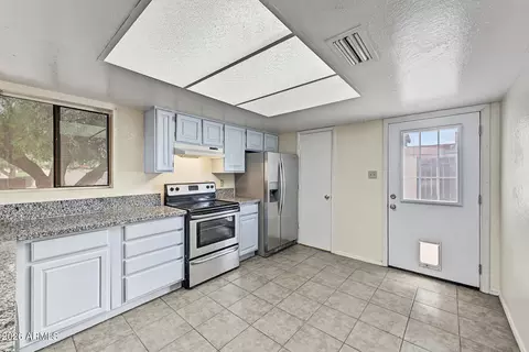 Kitchen - 2437 E Tracy Ln #1, Phoenix, AZ 85032 photo 1 of 3