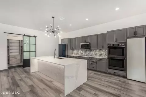 Kitchen - 9042 E Maple Leaf Dr, Tucson, AZ 85710 photo 1 of 2