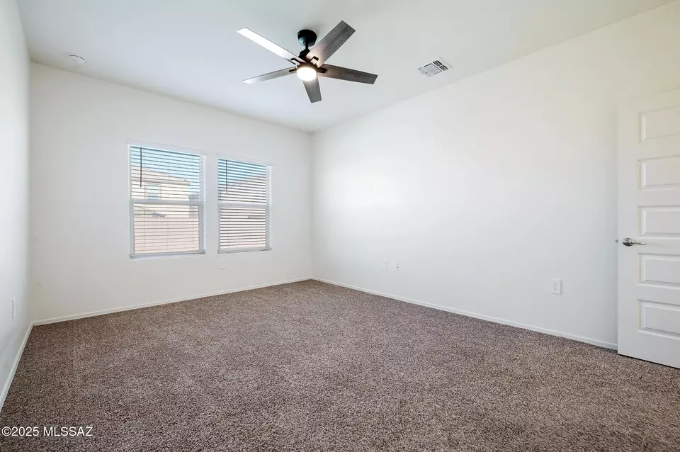 Bedroom - 9292 W Creosote Rain Dr, Marana, AZ 85653 photo 2 of 7