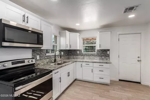 Kitchen - 1132 E 27th St, Tucson, AZ 85713 photo 1 of 2