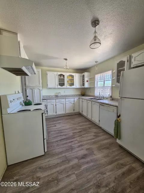 Kitchen - 883 E Old Pomerene Rd, Benson, AZ 85602 photo 2 of 3