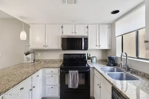 Kitchen - 154 E Pastime Rd, Tucson, AZ 85705 photo 2 of 3