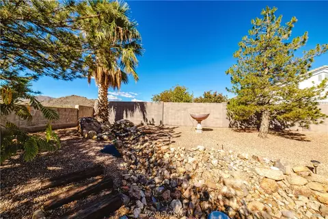 Exterior - 5565 N Storm Cloud Dr, Kingman, AZ 86409 photo 4 of 17