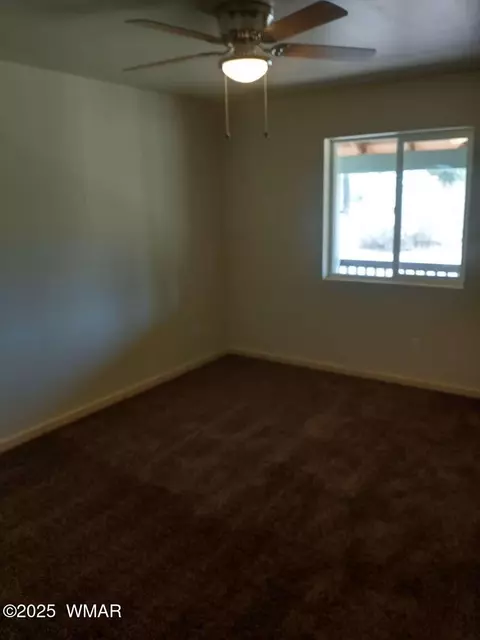Bedroom - 2224 Forest Ln, Overgaard, AZ 85933 photo 4 of 6