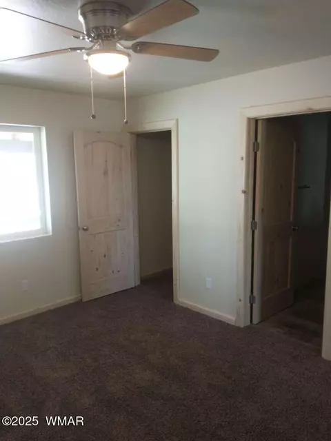 Bedroom - 2224 Forest Ln, Overgaard, AZ 85933 photo 5 of 6