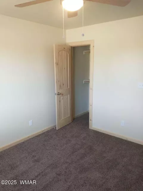 Bedroom - 2224 Forest Ln, Overgaard, AZ 85933 photo 3 of 6
