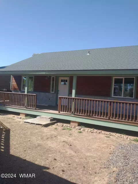 Exterior - 2224 Forest Ln, Overgaard, AZ 85933 photo 2 of 10