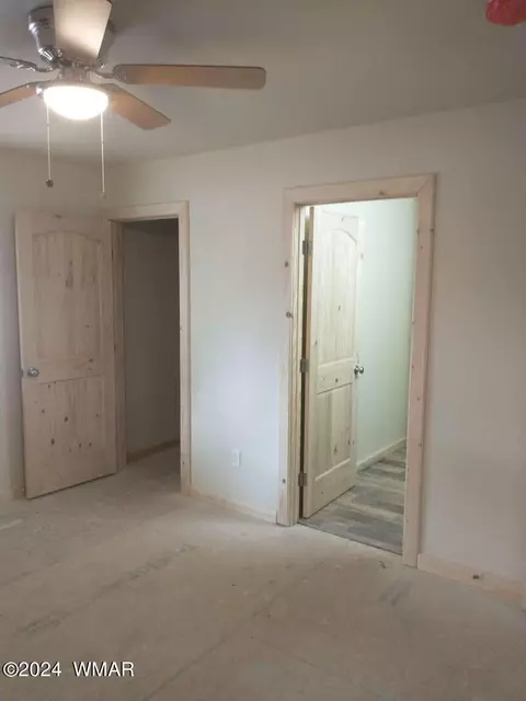 Bedroom - 2224 Forest Ln, Overgaard, AZ 85933 photo 2 of 6