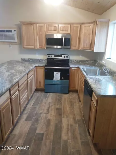 Kitchen - 2224 Forest Ln, Overgaard, AZ 85933 photo 2 of 2