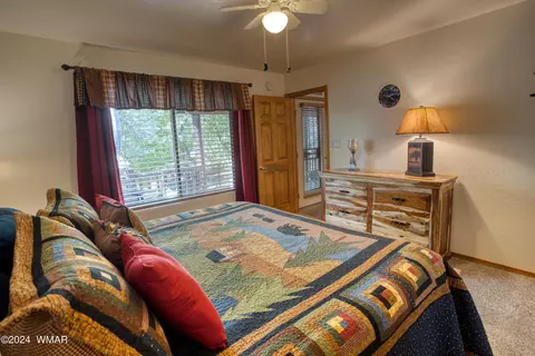 Bedroom - 2346 S Buffalo Loop, Overgaard, AZ 85933 photo 2 of 3