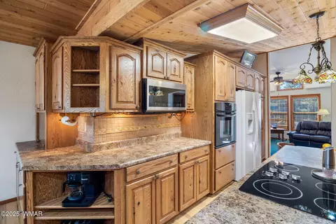 Kitchen - 1904 Rim View Ln, Overgaard, AZ 85933 photo 6 of 7