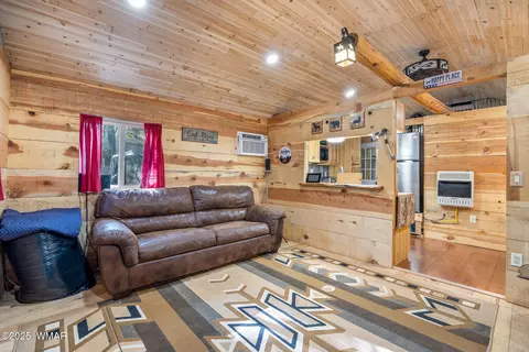 Living - 2190 Oval Dr, Overgaard, AZ 85933 photo 1 of 2