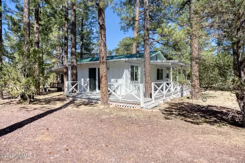 Exterior - 2905 Pine Rim Rd, Overgaard, AZ 85933 photo 5 of 7