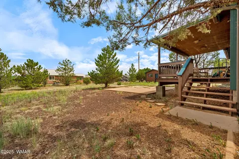 Exterior - 2208 Meadow Ln, Overgaard, AZ 85933 photo 9 of 14