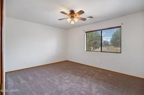 Bedroom - 2208 Meadow Ln, Overgaard, AZ 85933 photo 1 of 4