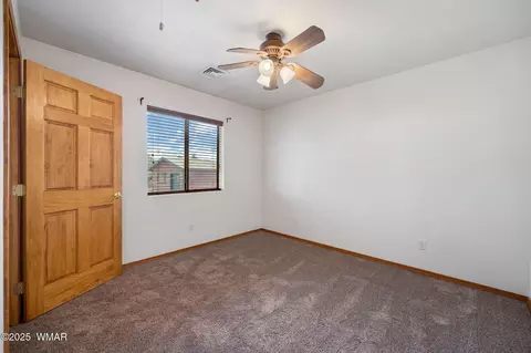 Bedroom - 2208 Meadow Ln, Overgaard, AZ 85933 photo 3 of 4