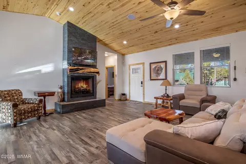 Living - 2728 Bain Trl, Overgaard, AZ 85933 photo 1 of 2